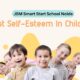 Promotional banner for JBM Smart Start School Noida featuring six diverse, smiling children with the title 'Boost Self-Esteem In Children