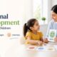 Teacher helping preschool child learn emotions using flashcards in a clean classroom environment, representing emotional development in early childhood